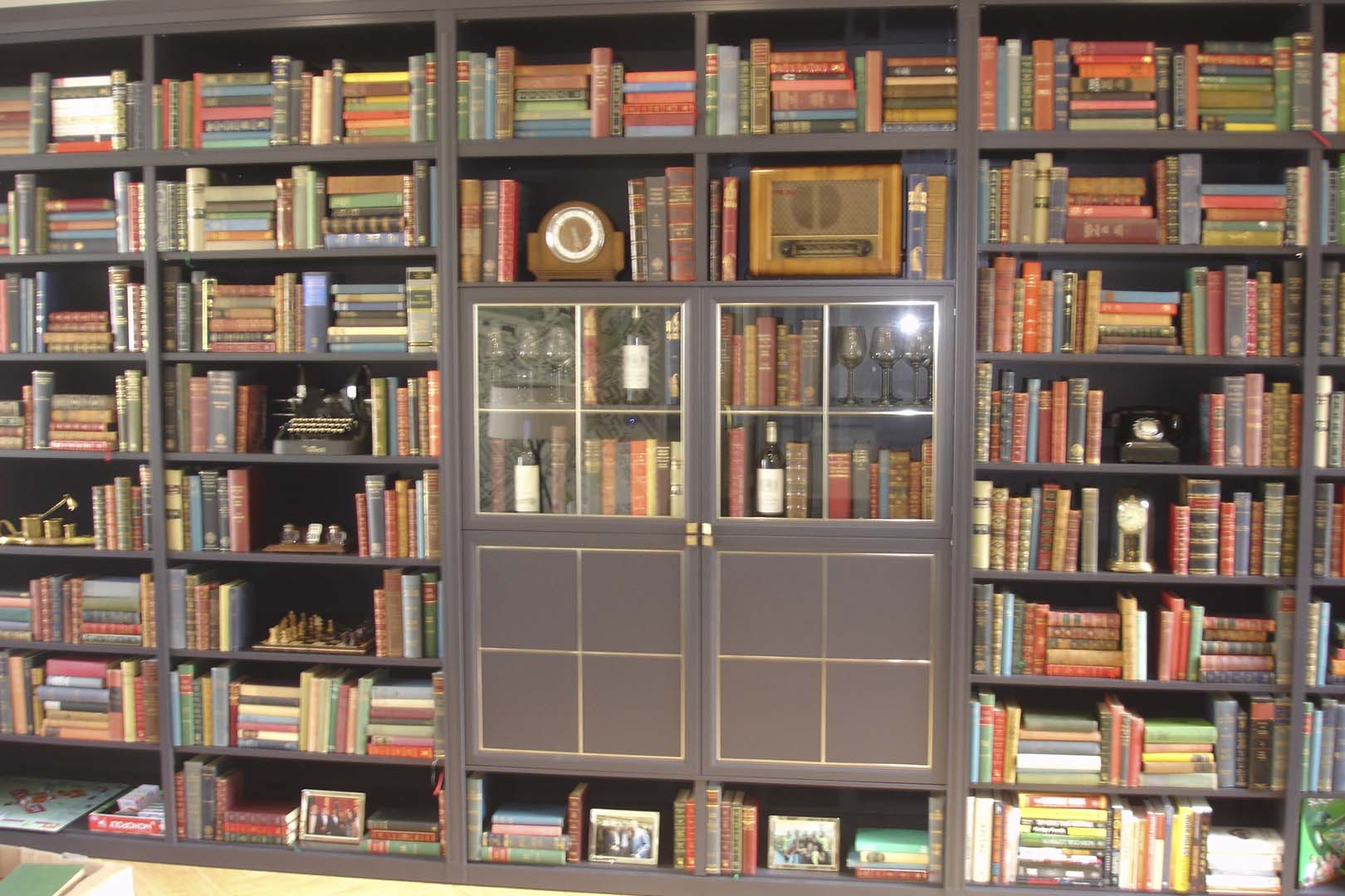 Vintage books styled in a boutique shop window display