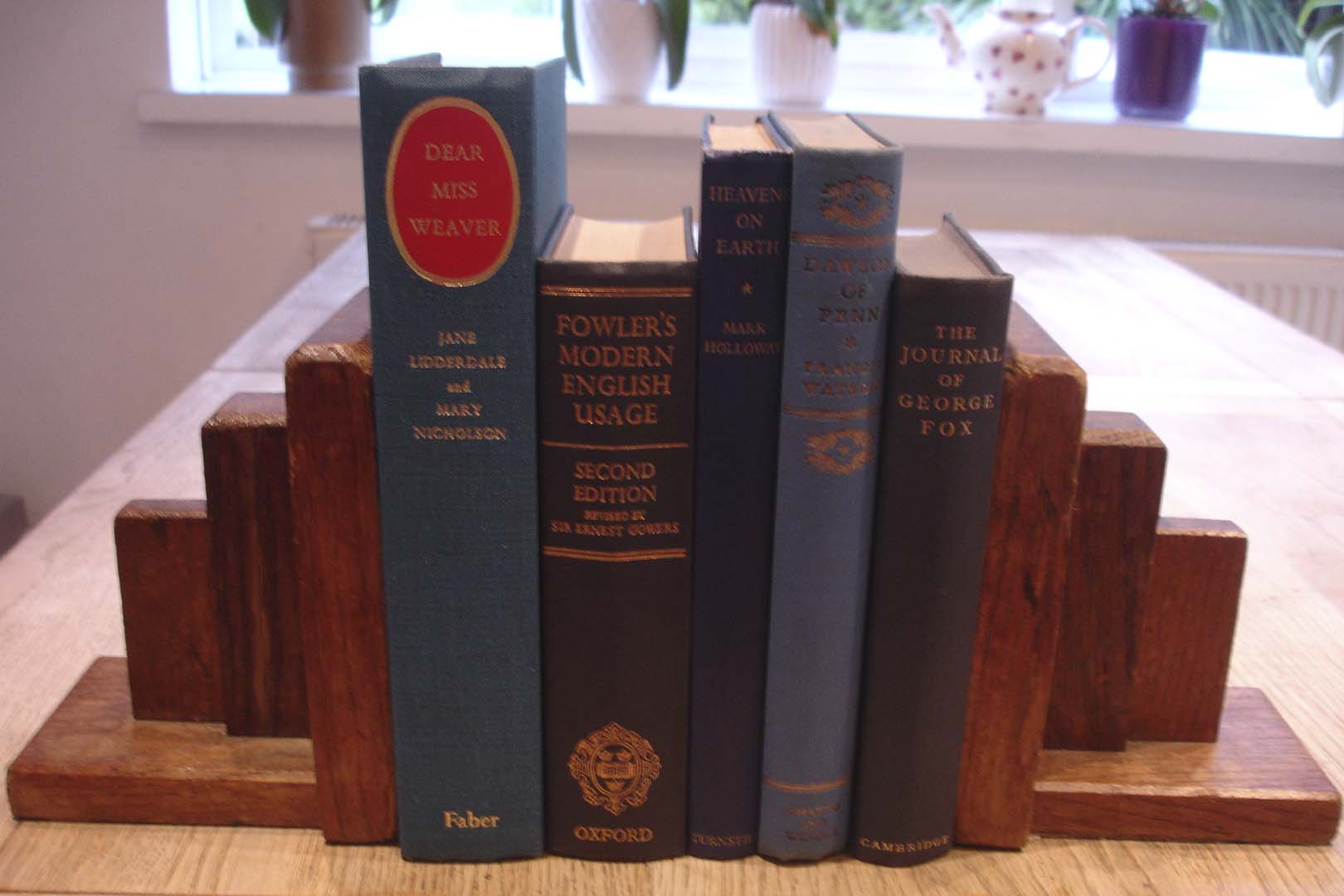 Books styled on shelving for an interior design project